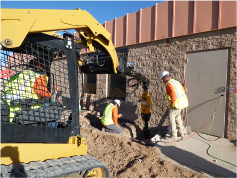 Hydraulic drive head at the building line