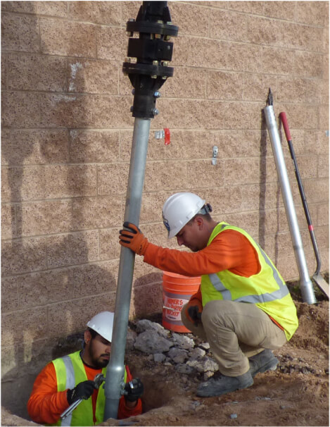 Guiding a pile shaft beside the footing